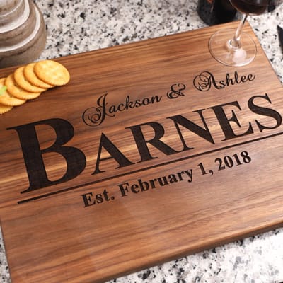 Bold Last Name Board with Names and Date, serving board engraved by Naked Wood Works
